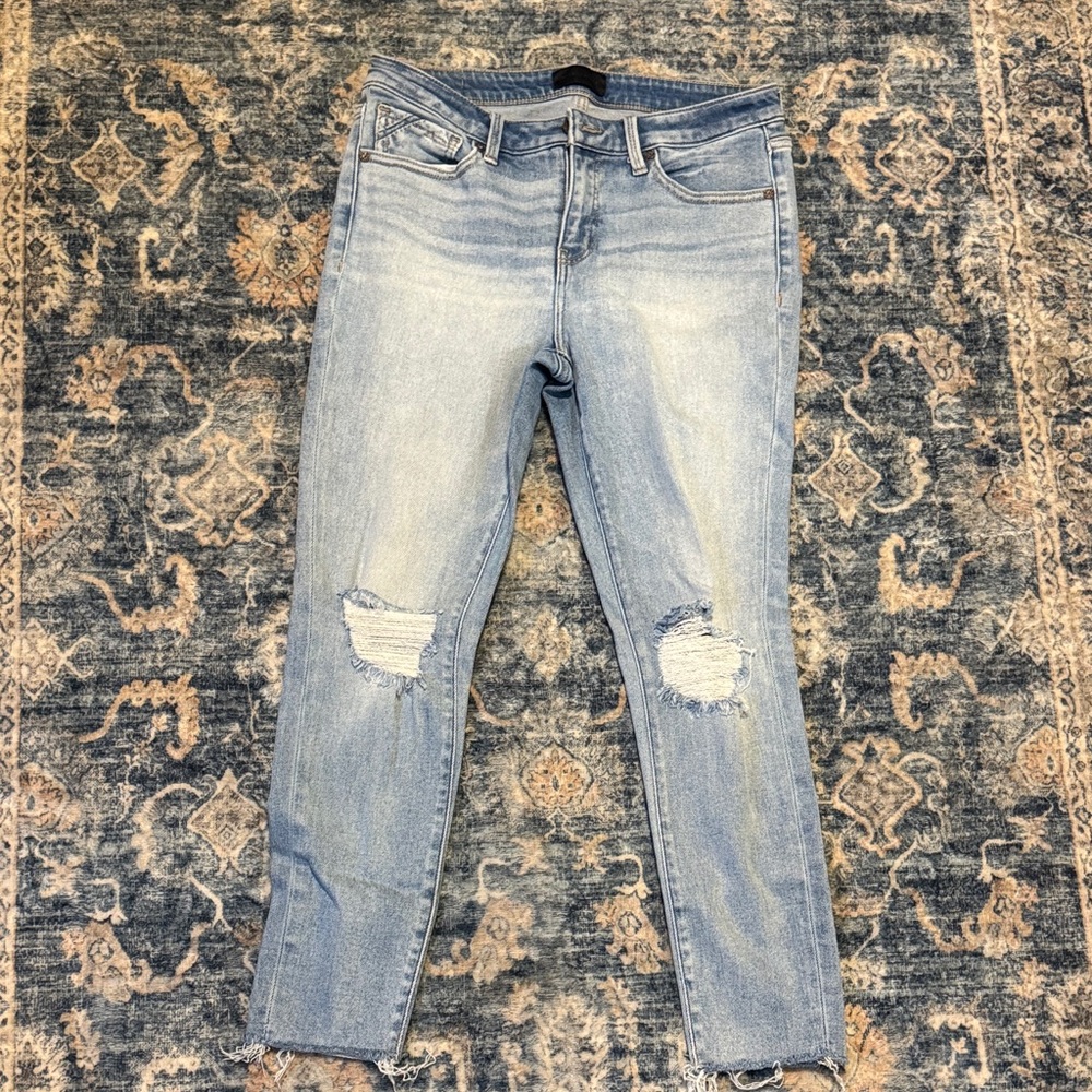 Buckle Light Wash Ripped Skinny Jeans